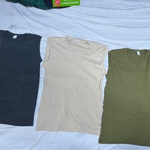 Set of Three Sleeveless Shirts in Black, Cream, and Green